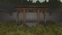 A Rustic log double T arch