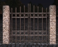 A Rounded stone high iron fence gate