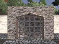 A Rounded stone barred wall