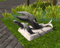 A Statue of whale and dolphin
